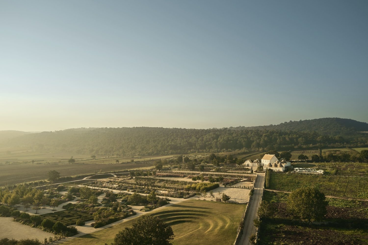 Masseria Pistola and Giardini Pistola in the golden light of the Canale di Pirro valley