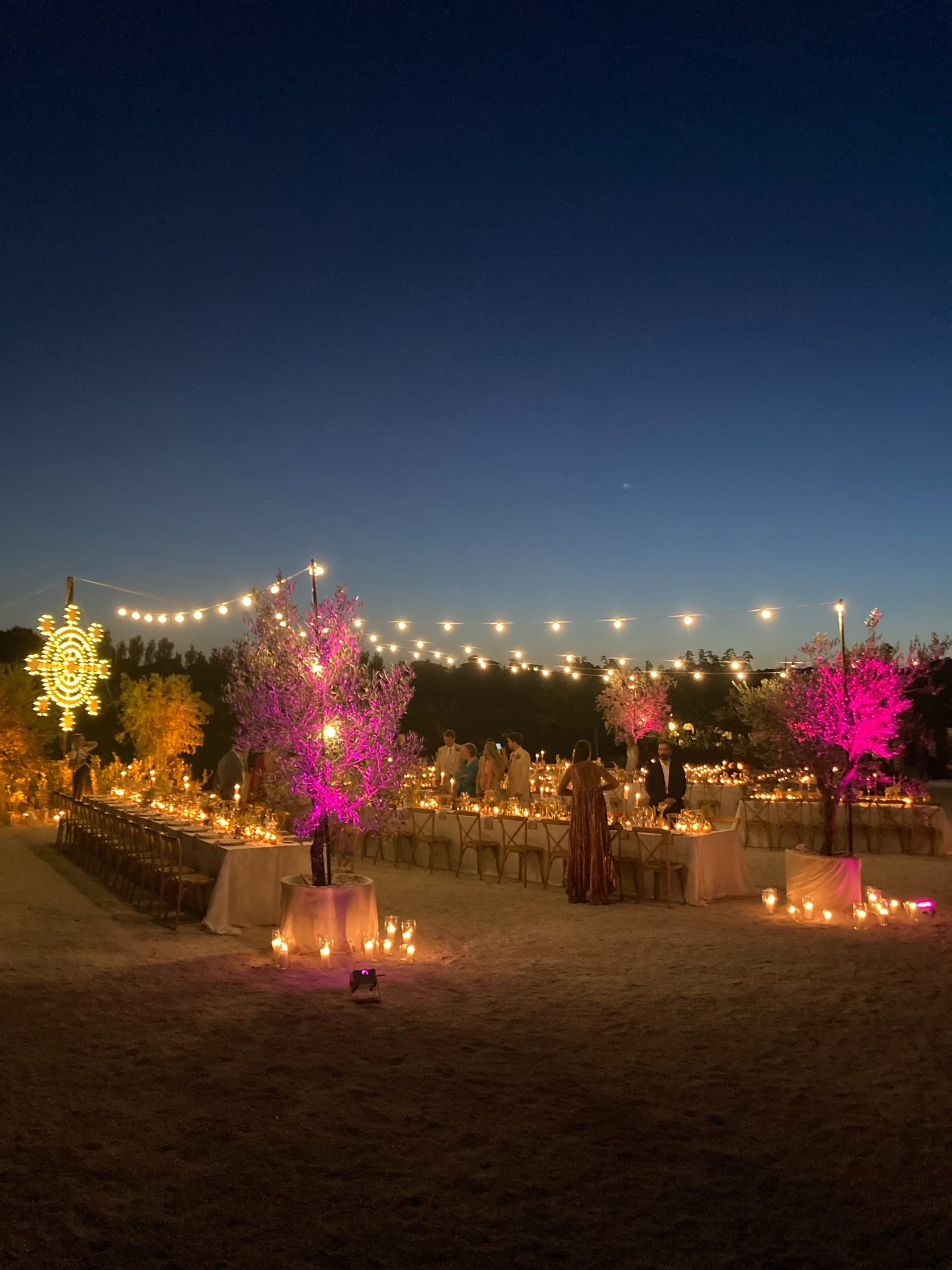 An open-air candlelit wedding dinner on Terrazza Due